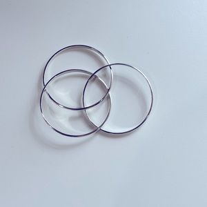 Sterling Silver Linked Set Of Three Bangle Bracelets.